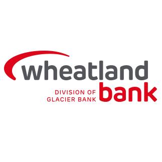 Wheatland Bank logo with red and gray text, stating “Wheatland Bank, Division of Glacier Bank,” and featuring a curved red line above the name.