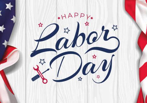 Celebrate Labor Day with this festive “Happy Labor Day” text, featuring stars, a wrench, and screwdriver, all bordered by stylized American flag fabric on both sides against a light wood background.